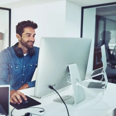 Opti man behind computer SH