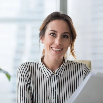 opti-female-with-papers-business-SH.jpg